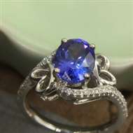 18k金坦桑石戒指，主石1.6ct，配钻0.23ct，总重3.34g，手寸13#，