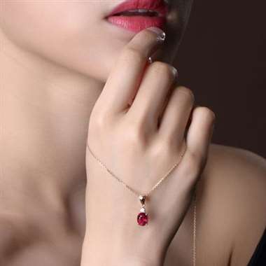 18K红碧玺吊坠，主石1.3ct，配钻0.03ct，金重约1g