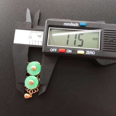 糯种苹果绿完美双扣，18k金镶嵌。尺寸：22.3*11.5*8.0