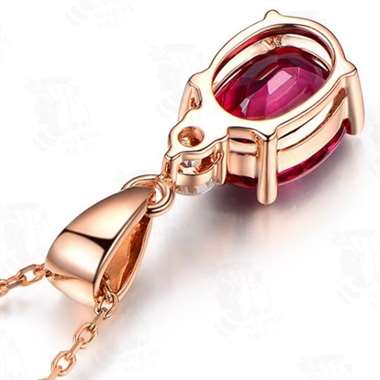 18K红碧玺吊坠,主石1.3ct,配钻0.03ct,金重约1g 18K红碧玺吊坠,主石1.3ct,配钻0.03ct,金重约1g