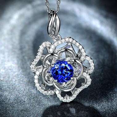 1.35ct坦桑石吊坠,18K镶嵌5A品质深邃明艳,主石1.35ct,钻石0.28ct,此款不含链、 1.35ct坦桑石吊坠,18K镶嵌5A品质深邃明艳,主石1.35ct,钻石0.28ct,此款不含链、